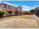 Spacious backyard featuring a grass area, and a block fence at 21334 E Lords Ct, Queen Creek, AZ 85142