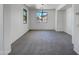 Open Living room with gray carpet, with a charming chandelier at 21334 E Lords Ct, Queen Creek, AZ 85142