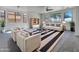 Bright living room featuring neutral walls, ample windows, and stylish black and white accents at 21334 E Lords Ct, Queen Creek, AZ 85142