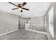 Spacious loft area with a ceiling fan, neutral walls and plush carpeting at 21716 S 225Th Way, Queen Creek, AZ 85142