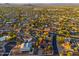 Spacious aerial view showing a large neighborhood with private pools and a variety of desert trees and greenery at 2712 E Mountain View Rd, Phoenix, AZ 85028