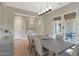 Beautiful dining room featuring a stylish light fixture and French door to backyard at 2784 E Honeysuckle Pl, Chandler, AZ 85286