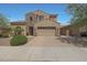 Charming two-story home featuring a stone accent wall and a spacious two-car garage at 2784 E Honeysuckle Pl, Chandler, AZ 85286