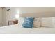 Bedroom with a king-size bed, decorative pillows, and a rustic wood nightstand at 2839 N 61St St, Scottsdale, AZ 85257