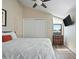 Bedroom offering natural light, wood-look flooring, storage dresser, and a double-door closet at 2839 N 61St St, Scottsdale, AZ 85257