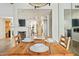Dining room with table set for a meal, views of the kitchen and living spaces at 2839 N 61St St, Scottsdale, AZ 85257