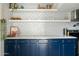 Beautiful kitchen with floating shelves and white subway tile backsplash at 2839 N 61St St, Scottsdale, AZ 85257