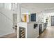 Modern kitchen features updated appliances, a wine cooler, and a convenient breakfast bar, perfect for casual dining at 2839 N 61St St, Scottsdale, AZ 85257