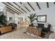Spacious living room flows to dining area with vaulted ceilings, wood beams, and stylish furniture, perfect for gatherings at 2839 N 61St St, Scottsdale, AZ 85257