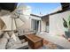 Inviting patio with cushioned seating, stylish coffee table, and bright floral rug, perfect for outdoor relaxation at 2839 N 61St St, Scottsdale, AZ 85257