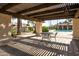 Community pool area with covered pergola featuring a table and seating at 2839 N 61St St, Scottsdale, AZ 85257