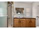 Bathroom with shower, vanity with sink, and mirror at 303 S Recker Rd # 141, Mesa, AZ 85206