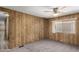 Bedroom featuring carpet flooring and natural light, offering a calming space at 303 S Recker Rd # 141, Mesa, AZ 85206