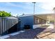 Exterior view with shed and covered parking at 303 S Recker Rd # 141, Mesa, AZ 85206