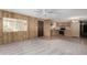 Open floor plan showing the living room connected to the kitchen with plenty of natural light at 303 S Recker Rd # 141, Mesa, AZ 85206