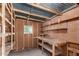 Unfinished shed with pegboard and shelving at 303 S Recker Rd # 141, Mesa, AZ 85206