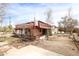 View of backyard with a raised deck, spiral staircase, and desert landscaping at 36655 N 25Th St, Cave Creek, AZ 85331