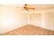 Bedroom featuring tile floors, closet doors, and ceiling fan at 36655 N 25Th St, Cave Creek, AZ 85331