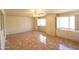 Bright bedroom featuring tiled flooring, large windows and a built-in storage unit at 36655 N 25Th St, Cave Creek, AZ 85331