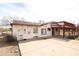 Back of home featuring a raised deck and a spacious patio area at 36655 N 25Th St, Cave Creek, AZ 85331