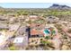 Wide aerial shot displaying property, desert landscape, golf course and mountain views at 3723 S Pottery Rd, Gold Canyon, AZ 85118