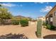 Desert backyard featuring a walking path, cacti, shrubs, and a scenic mountain view at 3723 S Pottery Rd, Gold Canyon, AZ 85118