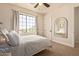Cozy bedroom with a large window and neutral decor at 3723 S Pottery Rd, Gold Canyon, AZ 85118