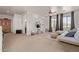 Spacious bedroom with a desk, area rug, and large windows at 3723 S Pottery Rd, Gold Canyon, AZ 85118