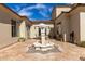 Serene courtyard with stone fountain feature and outdoor seating at 3723 S Pottery Rd, Gold Canyon, AZ 85118