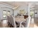 Elegant dining room featuring tray ceiling, statement chandelier, and seating for ten at 3723 S Pottery Rd, Gold Canyon, AZ 85118