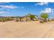 Spacious home featuring desert landscaping and a large driveway at 3723 S Pottery Rd, Gold Canyon, AZ 85118