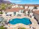 Aerial view of outdoor entertaining space with pool, seating, and outdoor kitchen at 3723 S Pottery Rd, Gold Canyon, AZ 85118