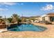 Stunning pool with integrated bar, multiple seating areas, and scenic mountain backdrop at 3723 S Pottery Rd, Gold Canyon, AZ 85118