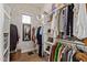 Organized walk-in closet with ample storage and neutral wallpaper at 3723 S Pottery Rd, Gold Canyon, AZ 85118