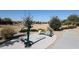 Community fitness area with various exercise machines and landscaped surroundings at 4226 W Brenley Dr, San Tan Valley, AZ 85144