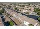 Overhead view of a residential area with neatly spaced homes, landscaping, and community vibe at 4626 N 111Th Ln, Phoenix, AZ 85037