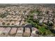 Aerial shot highlighting a community park nestled among well-maintained homes at 4626 N 111Th Ln, Phoenix, AZ 85037