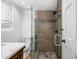 Modern bathroom features a glass-enclosed shower, stylish tile, and a marble vanity at 5838 E Berneil Ln, Paradise Valley, AZ 85253