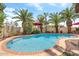 Stunning backyard featuring a sparkling pool and mature palm trees, offering a private paradise at 5839 W Ironwood Dr, Glendale, AZ 85302