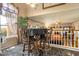 Cozy dining area featuring a table with elegant wooden chairs, and staircase leading to the game room at 5839 W Ironwood Dr, Glendale, AZ 85302
