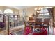Spacious dining room with hardwood floors, large window, and formal dining set at 5839 W Ironwood Dr, Glendale, AZ 85302