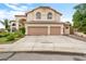 Charming two-story home featuring a two-car garage, tile roof, and desert landscaping at 5839 W Ironwood Dr, Glendale, AZ 85302
