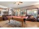 Large game room complete with pool table, comfortable seating, and ample natural light at 5839 W Ironwood Dr, Glendale, AZ 85302