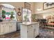 Spacious kitchen with an island, stainless steel appliances, and an open floor plan at 5839 W Ironwood Dr, Glendale, AZ 85302