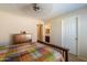 Spacious bedroom with adjoining bathroom and ceiling fan at 67 N Montoro Ln, Casa Grande, AZ 85194