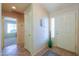 Welcoming foyer with tile flooring, neutral paint, and a decorative vase at 67 N Montoro Ln, Casa Grande, AZ 85194