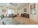 Cozy living room featuring comfortable seating and natural light at 67 N Montoro Ln, Casa Grande, AZ 85194