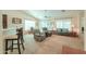 Spacious living room with plush seating and a ceiling fan at 67 N Montoro Ln, Casa Grande, AZ 85194