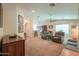 Open concept living area with bar stool seating area at 67 N Montoro Ln, Casa Grande, AZ 85194
