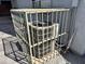 Air conditioning unit outside of the home, enclosed in a metal cage for protection at 720 W Lydia Ln, Phoenix, AZ 85041
